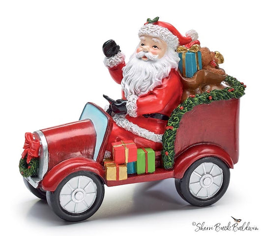 SANTA SITTING IN TRUCK FIGURINE